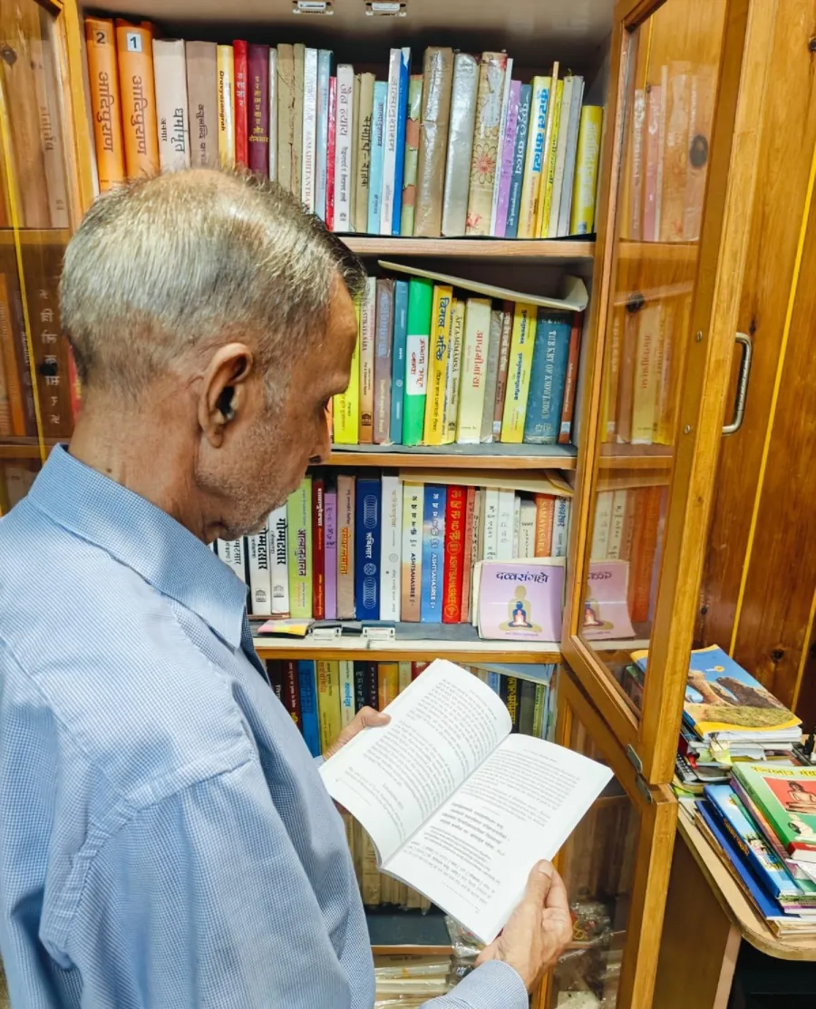 Vijay K. Jain reading in his study